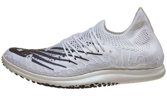 'Tocando la fibra': la locura por las zapatillas de carbono llega al triatlón. 'Tocando la fibra': la locura por las zapatillas de carbono llega al triatlón.